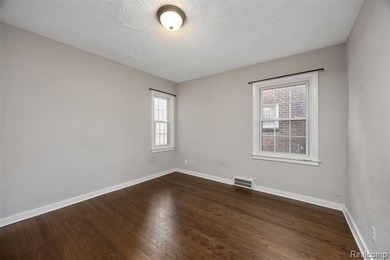 Welcome Home ! This brick bungalow offers an oversized primary on Lochmoor Club in Michigan - for sale on GolfHomes.com, golf home, golf lot