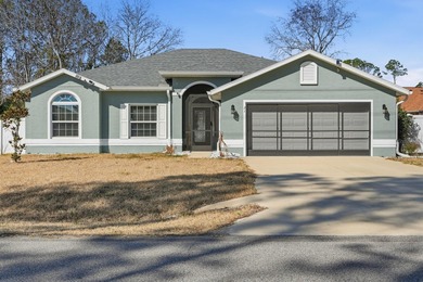 Welcome to this beautifully crafted 2023 SeaGate Homes residence on The Grand Club Cypress Course in Florida - for sale on GolfHomes.com, golf home, golf lot