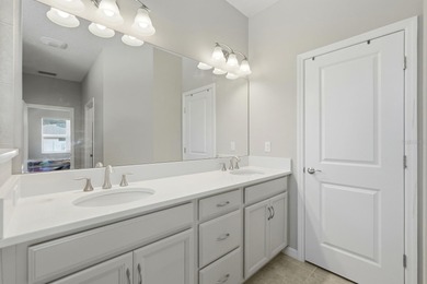 Welcome to this beautifully crafted 2023 SeaGate Homes residence on The Grand Club Cypress Course in Florida - for sale on GolfHomes.com, golf home, golf lot