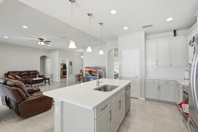 Welcome to this beautifully crafted 2023 SeaGate Homes residence on The Grand Club Cypress Course in Florida - for sale on GolfHomes.com, golf home, golf lot