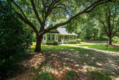 Welcome to Pawleys Island  where this beautiful cottage style on The Founders Club At Pawleys Island in South Carolina - for sale on GolfHomes.com, golf home, golf lot