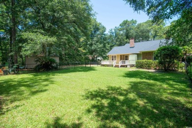 Welcome to Pawleys Island  where this beautiful cottage style on The Founders Club At Pawleys Island in South Carolina - for sale on GolfHomes.com, golf home, golf lot