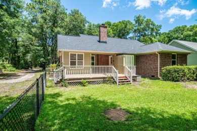 Welcome to Pawleys Island  where this beautiful cottage style on The Founders Club At Pawleys Island in South Carolina - for sale on GolfHomes.com, golf home, golf lot