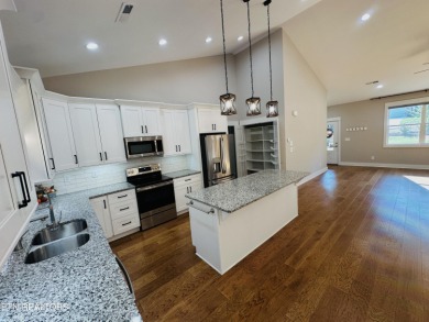 Come live on ''the Circle,'' the friendliest corner of Tellico on Tellico Village Golf Club in Tennessee - for sale on GolfHomes.com, golf home, golf lot