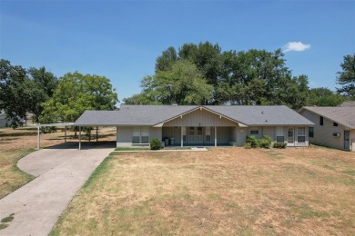 Nestled within Cedar Creek Country Club ,this charming home on Cedar Creek Country Club in Texas - for sale on GolfHomes.com, golf home, golf lot