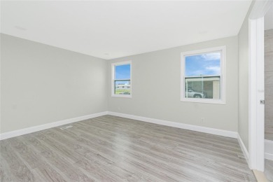 One or more photo(s) has been virtually staged. Move in Ready! on Oyster Creek Golf Club in Florida - for sale on GolfHomes.com, golf home, golf lot
