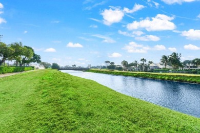 Bright and inviting ground-floor condo with stunning golf course on Boca Delray Golf and Country Club in Florida - for sale on GolfHomes.com, golf home, golf lot