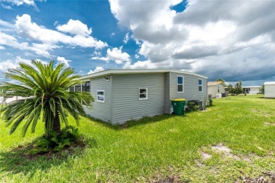 One or more photo(s) has been virtually staged. Move in Ready! on Oyster Creek Golf Club in Florida - for sale on GolfHomes.com, golf home, golf lot