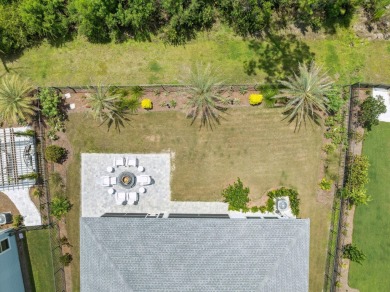 Tucked away on a quiet cul-de-sac in the exclusive, gated on Origins Golf Club in Florida - for sale on GolfHomes.com, golf home, golf lot