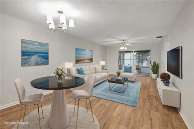 Welcome to this light-filled 2-bedroom, 2-bath end-unit villa in on Myerlee Country Club in Florida - for sale on GolfHomes.com, golf home, golf lot