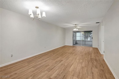 Welcome to this light-filled 2-bedroom, 2-bath end-unit villa in on Myerlee Country Club in Florida - for sale on GolfHomes.com, golf home, golf lot