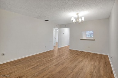 Welcome to this light-filled 2-bedroom, 2-bath end-unit villa in on Myerlee Country Club in Florida - for sale on GolfHomes.com, golf home, golf lot