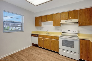 Welcome to this light-filled 2-bedroom, 2-bath end-unit villa in on Myerlee Country Club in Florida - for sale on GolfHomes.com, golf home, golf lot