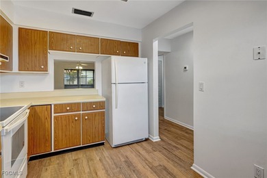 Welcome to this light-filled 2-bedroom, 2-bath end-unit villa in on Myerlee Country Club in Florida - for sale on GolfHomes.com, golf home, golf lot