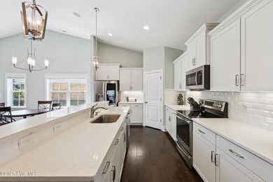 Situated on the 16th green of the Beau Rivage Golf Course, this on Beau Rivage Golf and Resort in North Carolina - for sale on GolfHomes.com, golf home, golf lot