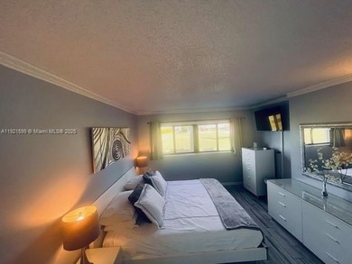 Beautiful totally renovated corner unit1 bedroom 1 bath, first on Ocean Village Golf Course in Florida - for sale on GolfHomes.com, golf home, golf lot