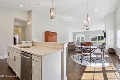 Situated on the 16th green of the Beau Rivage Golf Course, this on Beau Rivage Golf and Resort in North Carolina - for sale on GolfHomes.com, golf home, golf lot