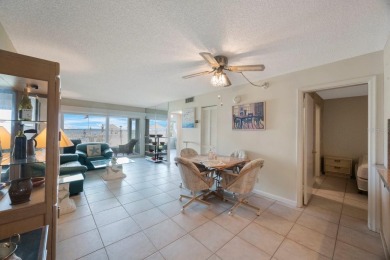 Experience Waterfront Living in this Charming 2-Bed, 2-Bath on Isla Del Sol Yacht and Country Club in Florida - for sale on GolfHomes.com, golf home, golf lot