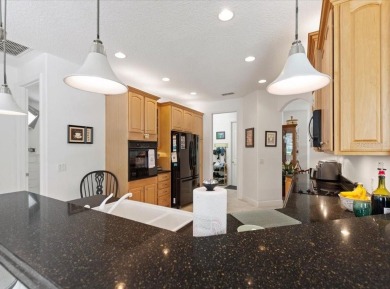 Fall in Love with this Stunning Customized Carnegie Model Home on Poinciana Golf Club in Florida - for sale on GolfHomes.com, golf home, golf lot