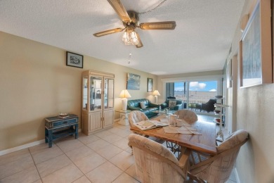 Experience Waterfront Living in this Charming 2-Bed, 2-Bath on Isla Del Sol Yacht and Country Club in Florida - for sale on GolfHomes.com, golf home, golf lot