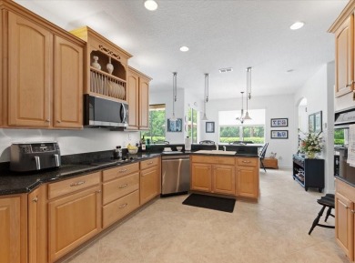 Fall in Love with this Stunning Customized Carnegie Model Home on Poinciana Golf Club in Florida - for sale on GolfHomes.com, golf home, golf lot