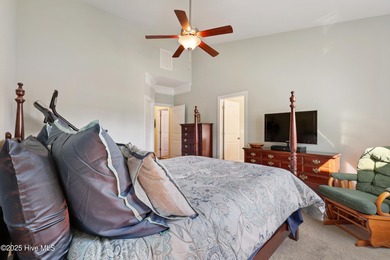 Situated on the 16th green of the Beau Rivage Golf Course, this on Beau Rivage Golf and Resort in North Carolina - for sale on GolfHomes.com, golf home, golf lot