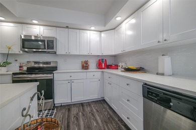 Discover the largest floor plan in the building with this on Inverrary Country Club in Florida - for sale on GolfHomes.com, golf home, golf lot