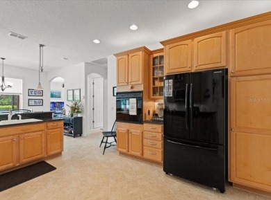 Fall in Love with this Stunning Customized Carnegie Model Home on Poinciana Golf Club in Florida - for sale on GolfHomes.com, golf home, golf lot