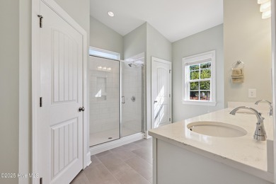 Situated on the 16th green of the Beau Rivage Golf Course, this on Beau Rivage Golf and Resort in North Carolina - for sale on GolfHomes.com, golf home, golf lot