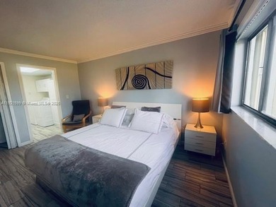 Beautiful totally renovated corner unit1 bedroom 1 bath, first on Ocean Village Golf Course in Florida - for sale on GolfHomes.com, golf home, golf lot