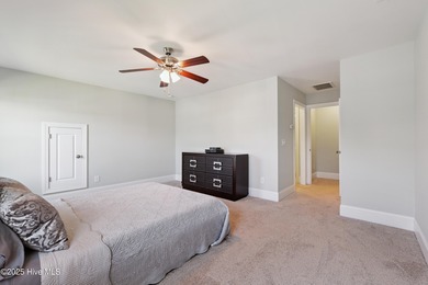 Situated on the 16th green of the Beau Rivage Golf Course, this on Beau Rivage Golf and Resort in North Carolina - for sale on GolfHomes.com, golf home, golf lot