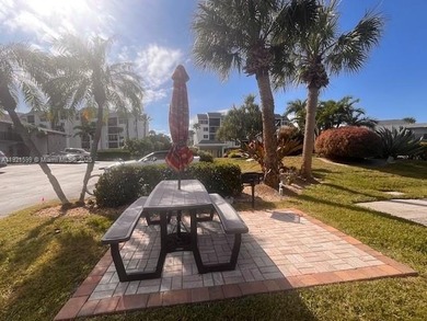 Beautiful totally renovated corner unit1 bedroom 1 bath, first on Ocean Village Golf Course in Florida - for sale on GolfHomes.com, golf home, golf lot