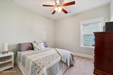 Situated on the 16th green of the Beau Rivage Golf Course, this on Beau Rivage Golf and Resort in North Carolina - for sale on GolfHomes.com, golf home, golf lot