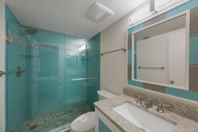 Experience Waterfront Living in this Charming 2-Bed, 2-Bath on Isla Del Sol Yacht and Country Club in Florida - for sale on GolfHomes.com, golf home, golf lot