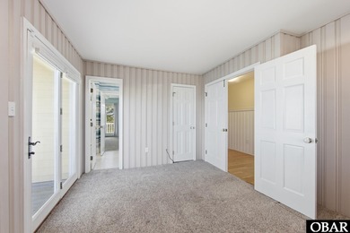 6005 S North Shore Ct sits in the Village at Nags Head, a on Nags Head Golf Links in North Carolina - for sale on GolfHomes.com, golf home, golf lot