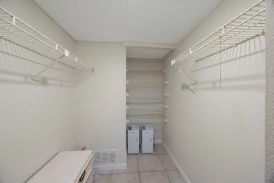 Experience Waterfront Living in this Charming 2-Bed, 2-Bath on Isla Del Sol Yacht and Country Club in Florida - for sale on GolfHomes.com, golf home, golf lot