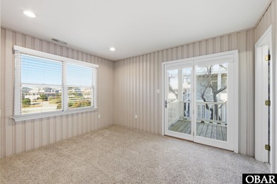 6005 S North Shore Ct sits in the Village at Nags Head, a on Nags Head Golf Links in North Carolina - for sale on GolfHomes.com, golf home, golf lot