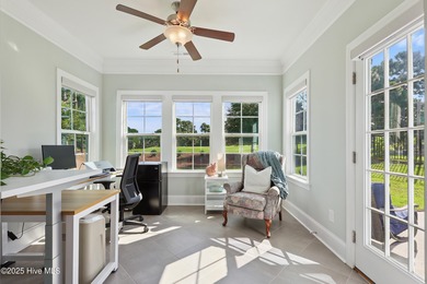 Situated on the 16th green of the Beau Rivage Golf Course, this on Beau Rivage Golf and Resort in North Carolina - for sale on GolfHomes.com, golf home, golf lot