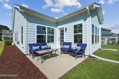 Situated on the 16th green of the Beau Rivage Golf Course, this on Beau Rivage Golf and Resort in North Carolina - for sale on GolfHomes.com, golf home, golf lot