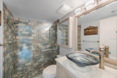 Experience Waterfront Living in this Charming 2-Bed, 2-Bath on Isla Del Sol Yacht and Country Club in Florida - for sale on GolfHomes.com, golf home, golf lot