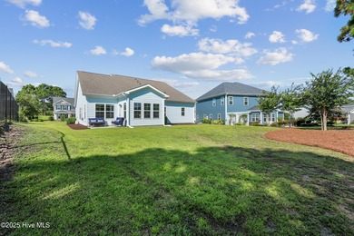 Situated on the 16th green of the Beau Rivage Golf Course, this on Beau Rivage Golf and Resort in North Carolina - for sale on GolfHomes.com, golf home, golf lot