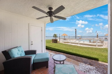 Experience Waterfront Living in this Charming 2-Bed, 2-Bath on Isla Del Sol Yacht and Country Club in Florida - for sale on GolfHomes.com, golf home, golf lot