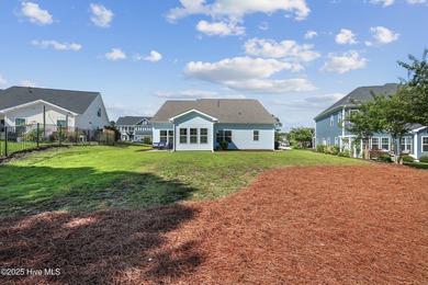 Situated on the 16th green of the Beau Rivage Golf Course, this on Beau Rivage Golf and Resort in North Carolina - for sale on GolfHomes.com, golf home, golf lot