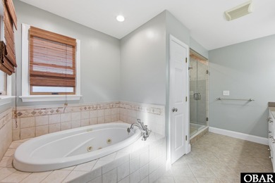 6005 S North Shore Ct sits in the Village at Nags Head, a on Nags Head Golf Links in North Carolina - for sale on GolfHomes.com, golf home, golf lot