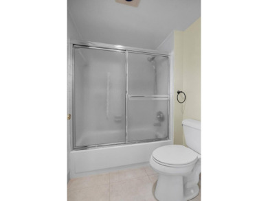 BEAUTIFUL LIGHT AND BRIGHT 2 BEDROOM, 2.5 BATH TOWNHOUSE ON GOLF on Boca Lago Golf and Country Club in Florida - for sale on GolfHomes.com, golf home, golf lot