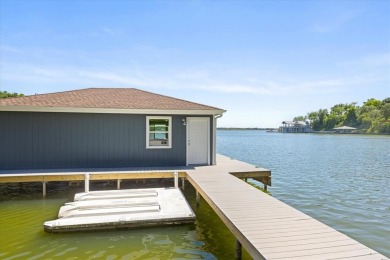 Welcome to your dream lakefront retreat! Situated on nearly half on De Cordova Bend Country Club in Texas - for sale on GolfHomes.com, golf home, golf lot