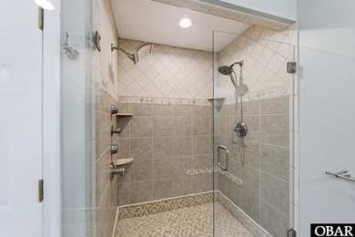 6005 S North Shore Ct sits in the Village at Nags Head, a on Nags Head Golf Links in North Carolina - for sale on GolfHomes.com, golf home, golf lot