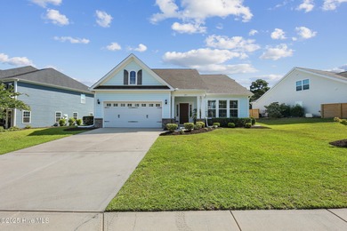 Situated on the 16th green of the Beau Rivage Golf Course, this on Beau Rivage Golf and Resort in North Carolina - for sale on GolfHomes.com, golf home, golf lot