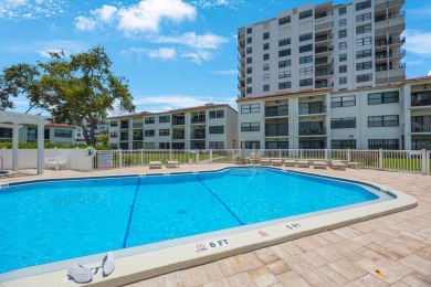 Experience Waterfront Living in this Charming 2-Bed, 2-Bath on Isla Del Sol Yacht and Country Club in Florida - for sale on GolfHomes.com, golf home, golf lot