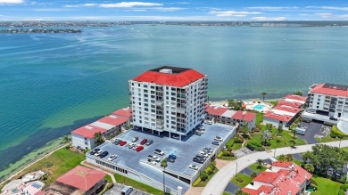 Experience Waterfront Living in this Charming 2-Bed, 2-Bath on Isla Del Sol Yacht and Country Club in Florida - for sale on GolfHomes.com, golf home, golf lot